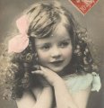 Carte postale ancienne＊巻き毛にリボンをつけた女の子<img class='new_mark_img2' src='https://img.shop-pro.jp/img/new/icons48.gif' style='border:none;display:inline;margin:0px;padding:0px;width:auto;' />
