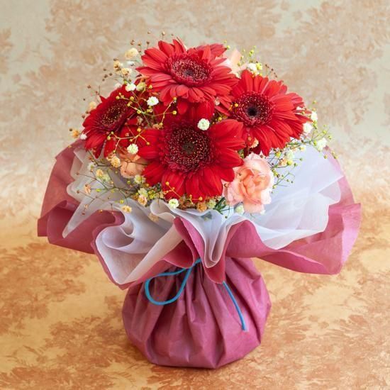 <img class='new_mark_img1' src='https://img.shop-pro.jp/img/new/icons1.gif' style='border:none;display:inline;margin:0px;padding:0px;width:auto;' />生花・Monthly Flower ガーベラのスタンディングブーケ