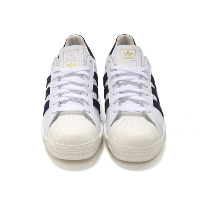 Adidas superstar white 2024 with navy stripes