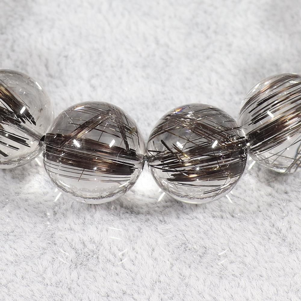 水晶の透明感&タイチンルチルのキャッツアイ効果が楽しめる】タイチン