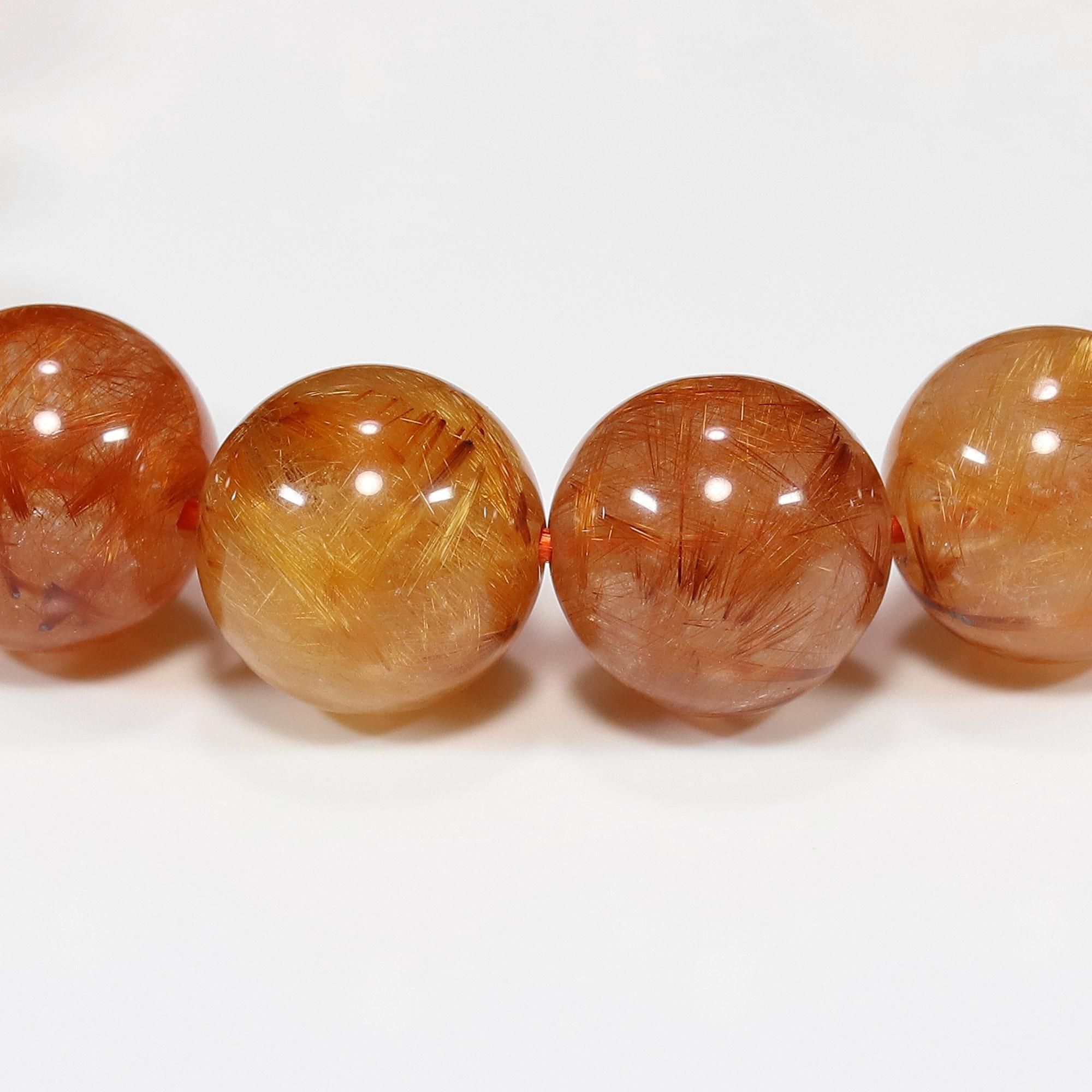 オレンジルチルブレスレット　ルチルクォーツ　7 太陽の針】☆鮮烈な輝き！はじけるオレンジ針☆澄み渡る水晶☆金運と