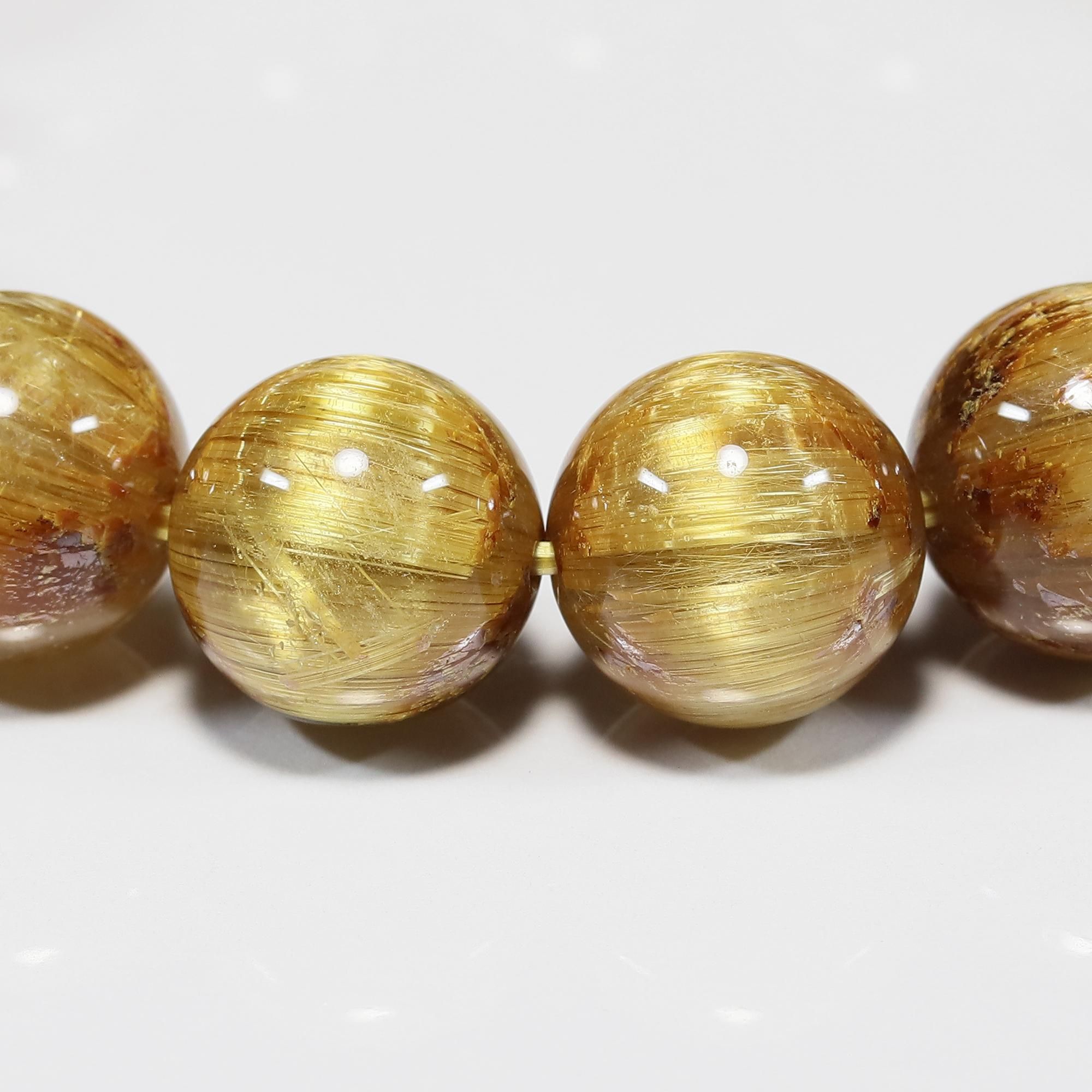 プレミアム タイチンキャッツアイルチルクォーツ 12.5mm玉