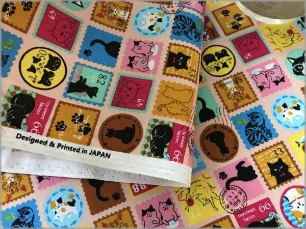 シーチング 生地】ネコ切手*スタンプ柄*pink*2C - 生地通販 マーブルマーケット シーチング 生地】ネコ切手*スタンプ柄*pink*2C - 生地通販 マーブルマーケット