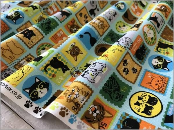 シーチング 生地 ネコ切手 スタンプ柄 スタンプ柄 Mint 2e 生地通販 マーブルマーケット