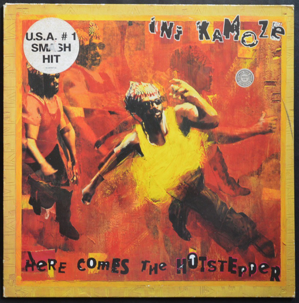 INI KAMOZE / HERE COMES THE HOTSTEPPER (12