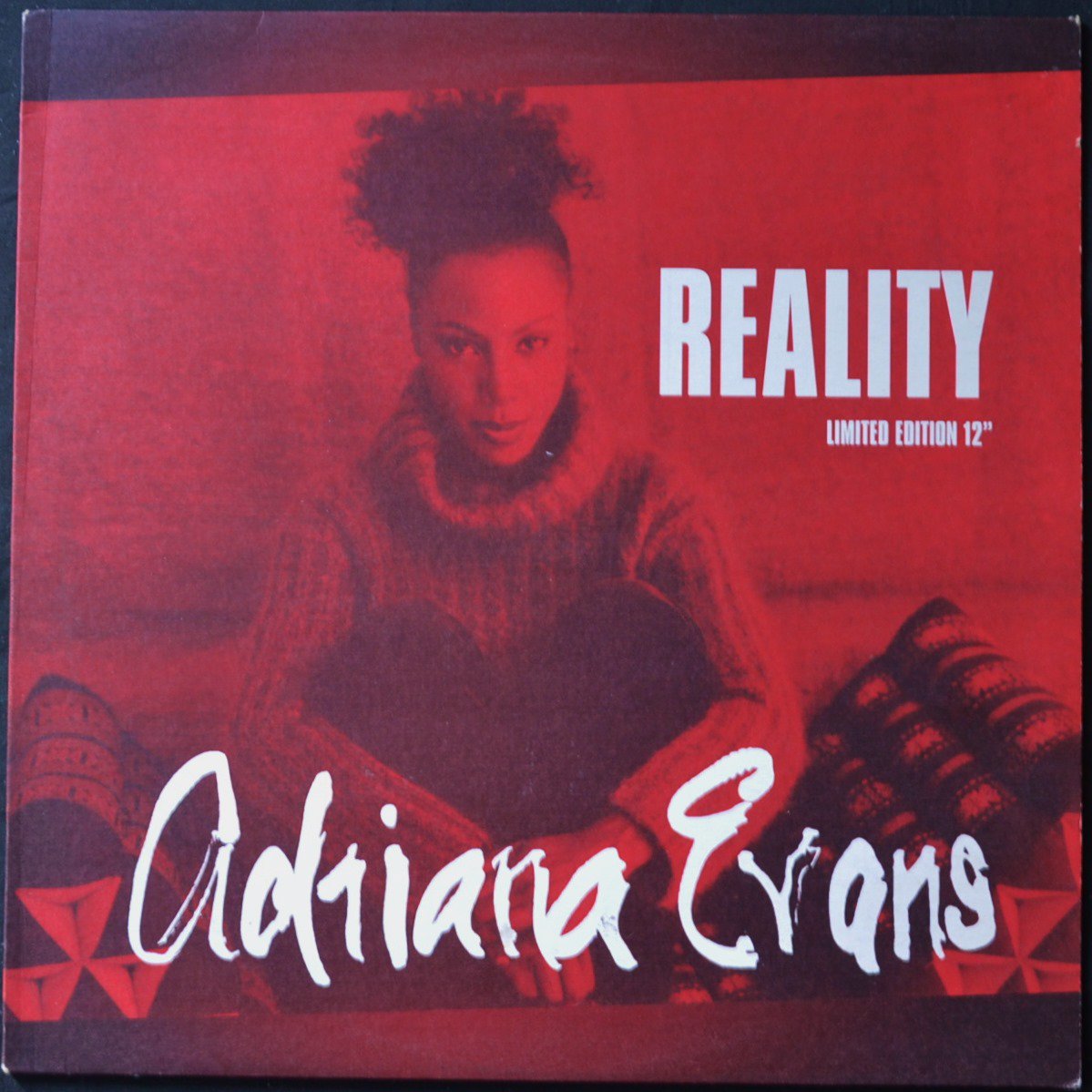 ADRIANA EVANS / REALITY (12