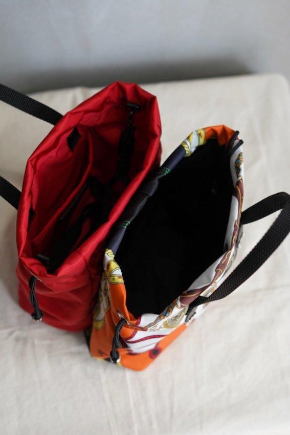 print drawstring bag (ORANGE) - IDIOME | ONLINE SHOP 熊本の